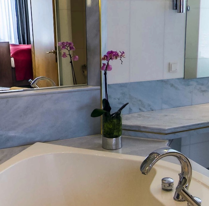 Orchid on the marble vanity counter
